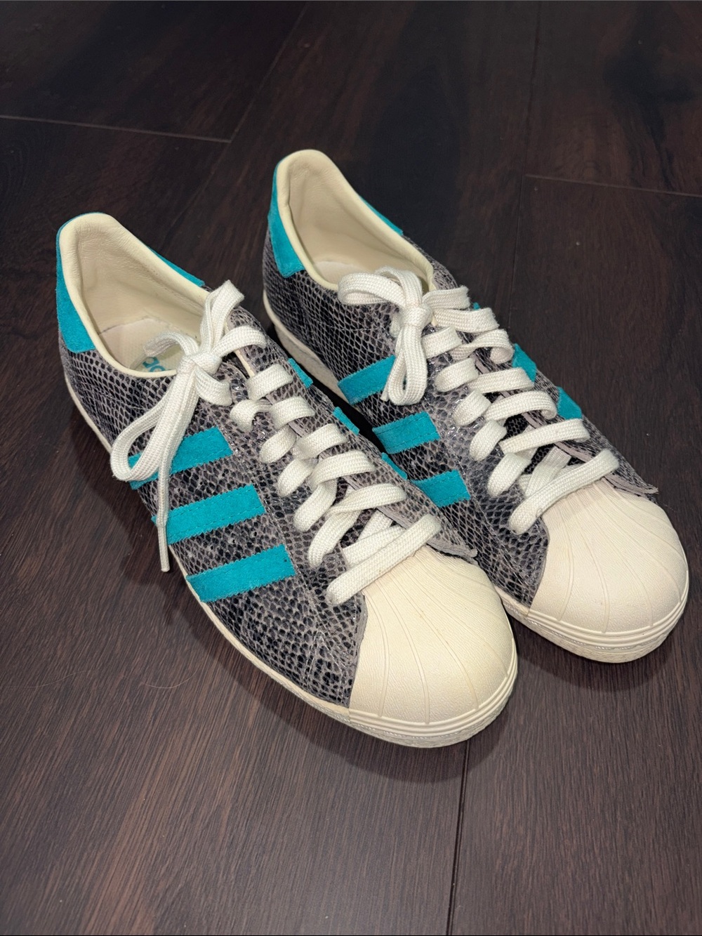 adidas Women’s Teal-Accented Black Snake Print Shell-Toe Sneakers